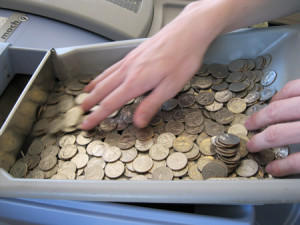 The coin counting machine is an important part of any trip to Young Americans Bank.