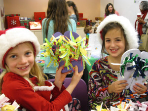 The young ladies of "Funky Flip Flops" show of their favorite creations during the December Marketplace.