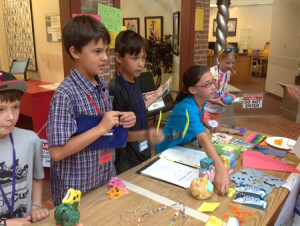 Budding entrepreneurs hawk their products during the Run Your Own Business Mini Marketplace two weeks ago.