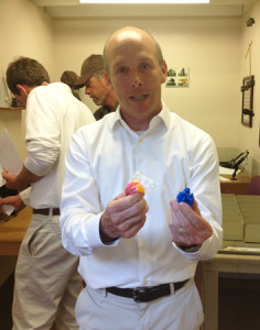 Evan Borg, International Towne Director, shows off his sales skills to move his shop's products.