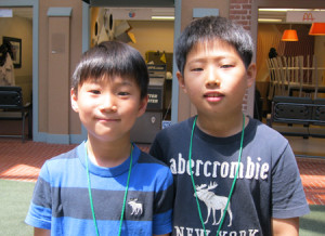 Joon and Dennis are cousins attending Young AmeriTowne summer camp.  Dennis is visiting for the summer from Korea and is spending one of his weeks in Young AmeriTowne.