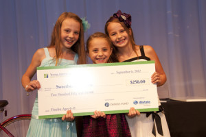 The Sweet Bee Sisters show off their check as finalists in 2012.