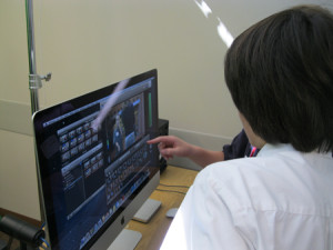 A Timber Trail Elementary student edits the TV broadcast via computer.