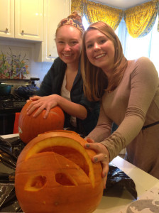 Sydney and Martha pose in the midst of carving.