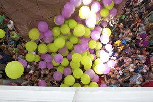 To celebrate 25 years, Young Americans threw a Carnival for nearly 3,000 people. It included a balloon drop with cash.