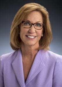 Margaret Kelly Headshot with Glasses