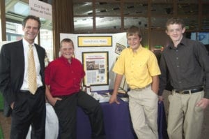 Business Competition winner Austin Honey with their mentor, Jack Pottle, in 2009.