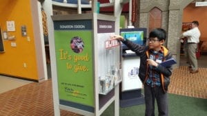 Students Donating in Station at YAT