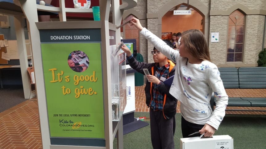 Students Donating in Station at YAT