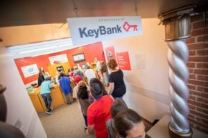 KeyBank Sign with Students Inside
