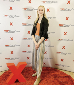 Anna Brekken posing on the red carpet for TEDx-Cherry Creek